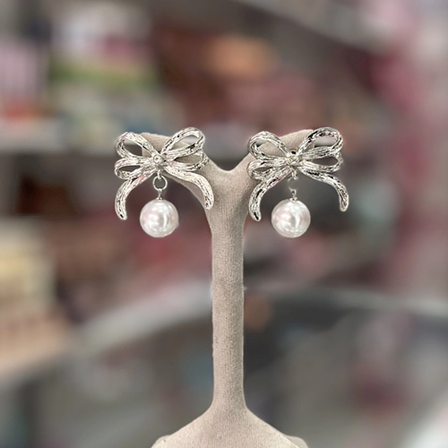 گوشواره پاپیونی و مروارید گوشواره پاپیونی و مروارید