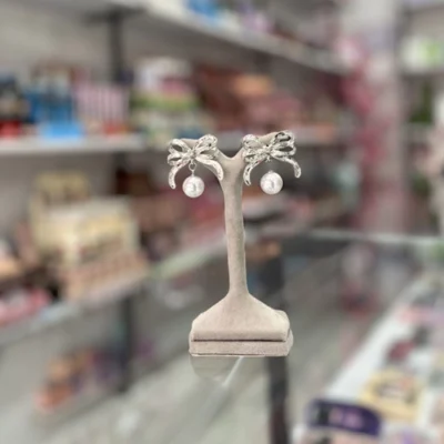 گوشواره پاپیونی و مرواریدی